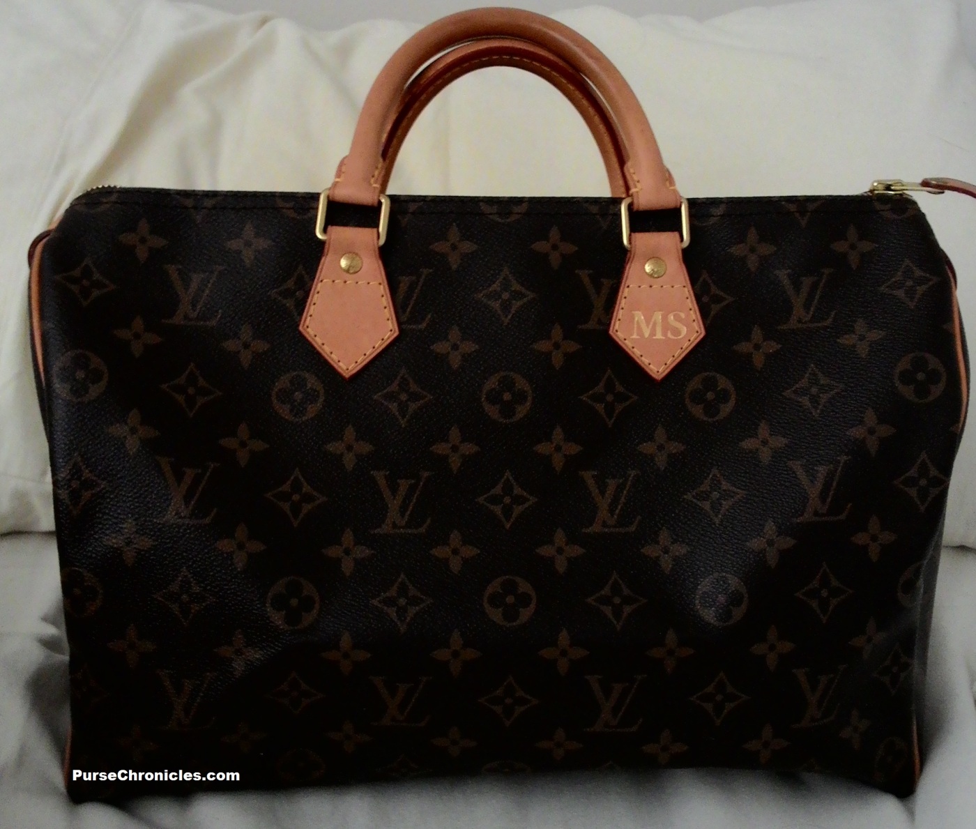 SOLD LOUIS VUITTON Iconic LV remains a classic and is timeless! I